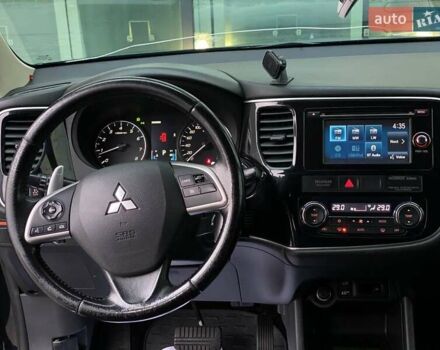 Черный Мицубиси Аутлендер, объемом двигателя 2.36 л и пробегом 212 тыс. км за 12990 $, фото 34 на Automoto.ua