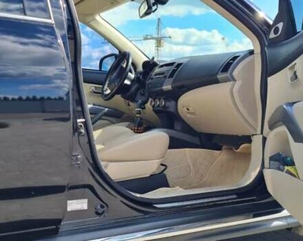 Черный Мицубиси Аутлендер, объемом двигателя 2.27 л и пробегом 195 тыс. км за 10500 $, фото 8 на Automoto.ua