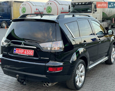 Чорний Міцубісі Аутлендер, об'ємом двигуна 2.3 л та пробігом 124 тис. км за 11999 $, фото 109 на Automoto.ua