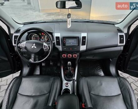 Черный Мицубиси Аутлендер, объемом двигателя 2.2 л и пробегом 188 тыс. км за 10999 $, фото 46 на Automoto.ua