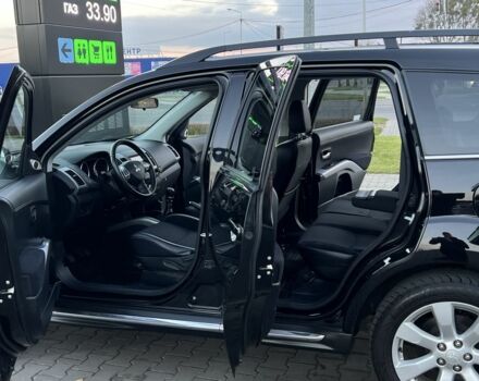 Черный Мицубиси Аутлендер, объемом двигателя 2.3 л и пробегом 124 тыс. км за 11999 $, фото 10 на Automoto.ua