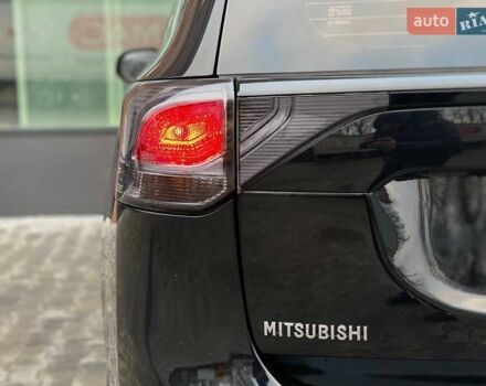 Черный Мицубиси Аутлендер, объемом двигателя 2.36 л и пробегом 212 тыс. км за 12990 $, фото 10 на Automoto.ua