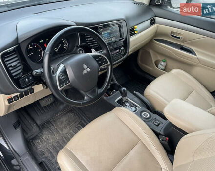 Чорний Міцубісі Аутлендер, об'ємом двигуна 2.27 л та пробігом 203 тис. км за 12600 $, фото 9 на Automoto.ua