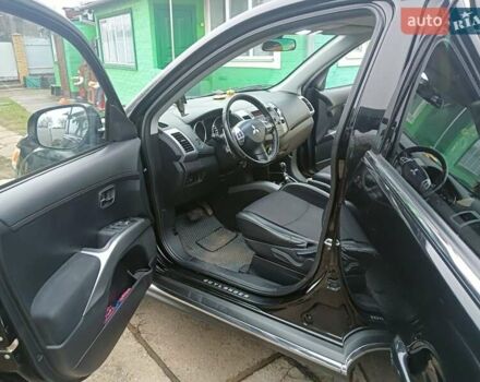 Черный Мицубиси Аутлендер, объемом двигателя 2.2 л и пробегом 218 тыс. км за 11500 $, фото 17 на Automoto.ua