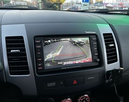 Черный Мицубиси Аутлендер, объемом двигателя 2.3 л и пробегом 124 тыс. км за 11999 $, фото 18 на Automoto.ua