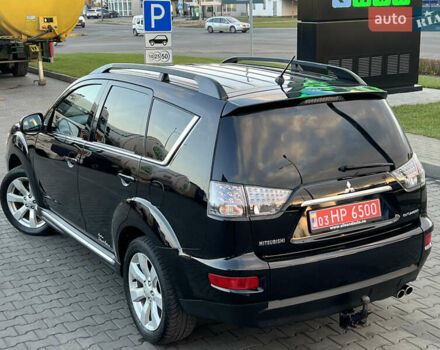 Чорний Міцубісі Аутлендер, об'ємом двигуна 2.3 л та пробігом 124 тис. км за 11999 $, фото 3 на Automoto.ua