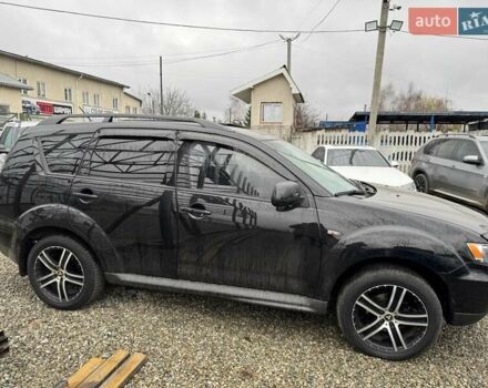Чорний Міцубісі Аутлендер, об'ємом двигуна 2.36 л та пробігом 210 тис. км за 10500 $, фото 3 на Automoto.ua
