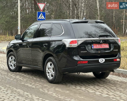 Чорний Міцубісі Аутлендер, об'ємом двигуна 2.2 л та пробігом 176 тис. км за 13500 $, фото 11 на Automoto.ua