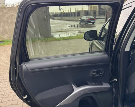 Чорний Міцубісі Аутлендер, об'ємом двигуна 2.36 л та пробігом 96 тис. км за 11700 $, фото 25 на Automoto.ua