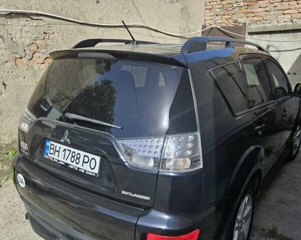 Чорний Міцубісі Аутлендер, об'ємом двигуна 2.36 л та пробігом 164 тис. км за 10800 $, фото 3 на Automoto.ua