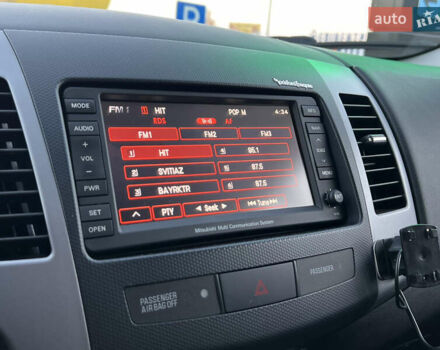 Чорний Міцубісі Аутлендер, об'ємом двигуна 2.3 л та пробігом 124 тис. км за 11999 $, фото 59 на Automoto.ua