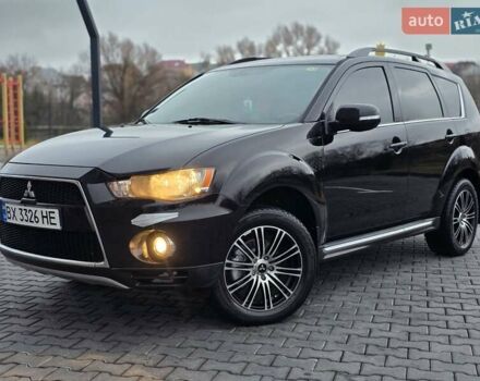 Черный Мицубиси Аутлендер, объемом двигателя 2.2 л и пробегом 188 тыс. км за 10999 $, фото 1 на Automoto.ua