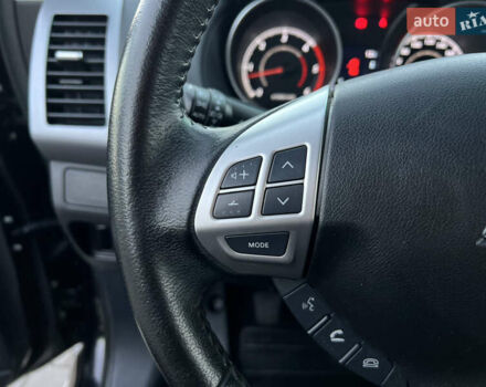 Чорний Міцубісі Аутлендер, об'ємом двигуна 2.3 л та пробігом 124 тис. км за 11999 $, фото 44 на Automoto.ua