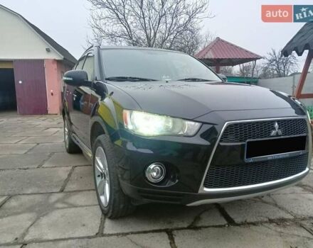 Черный Мицубиси Аутлендер, объемом двигателя 2.2 л и пробегом 218 тыс. км за 11500 $, фото 2 на Automoto.ua