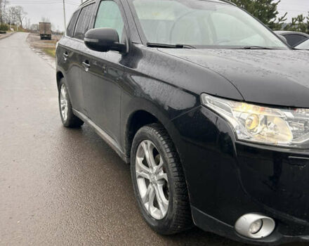 Черный Мицубиси Аутлендер, объемом двигателя 2.27 л и пробегом 202 тыс. км за 13100 $, фото 1 на Automoto.ua