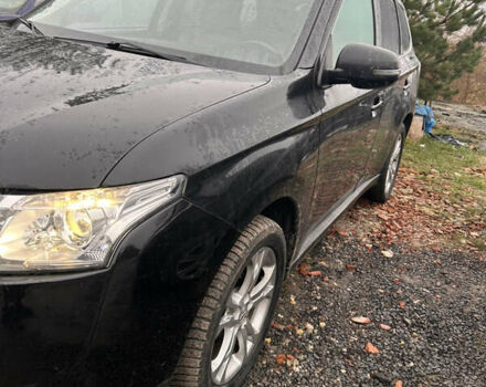 Черный Мицубиси Аутлендер, объемом двигателя 2.27 л и пробегом 202 тыс. км за 13100 $, фото 5 на Automoto.ua