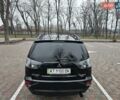 Чорний Міцубісі Аутлендер, об'ємом двигуна 2 л та пробігом 123 тис. км за 10500 $, фото 16 на Automoto.ua