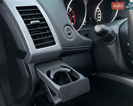 Чорний Міцубісі Аутлендер, об'ємом двигуна 2.3 л та пробігом 124 тис. км за 11999 $, фото 62 на Automoto.ua