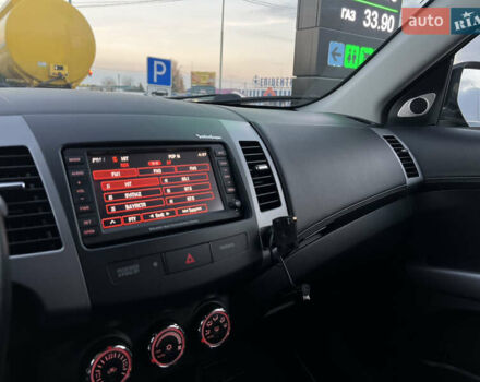 Чорний Міцубісі Аутлендер, об'ємом двигуна 2.3 л та пробігом 124 тис. км за 11999 $, фото 55 на Automoto.ua