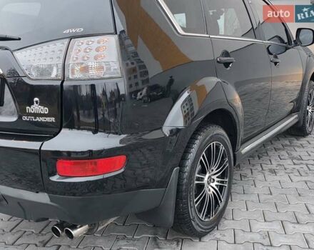 Черный Мицубиси Аутлендер, объемом двигателя 2.2 л и пробегом 188 тыс. км за 10999 $, фото 20 на Automoto.ua