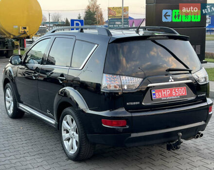 Чорний Міцубісі Аутлендер, об'ємом двигуна 2.3 л та пробігом 124 тис. км за 11999 $, фото 110 на Automoto.ua