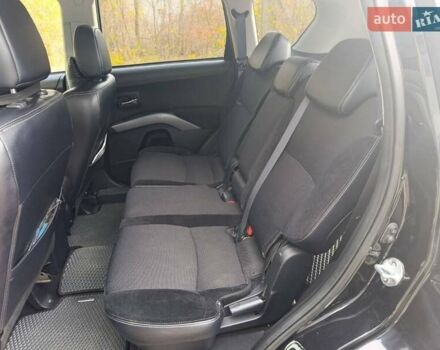 Черный Мицубиси Аутлендер, объемом двигателя 2.2 л и пробегом 218 тыс. км за 11800 $, фото 1 на Automoto.ua