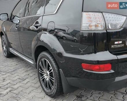 Черный Мицубиси Аутлендер, объемом двигателя 2.2 л и пробегом 188 тыс. км за 10999 $, фото 19 на Automoto.ua
