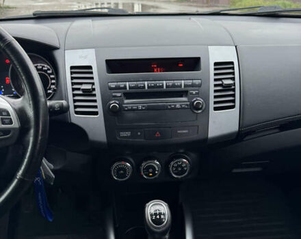 Чорний Міцубісі Аутлендер, об'ємом двигуна 2.36 л та пробігом 96 тис. км за 11700 $, фото 32 на Automoto.ua