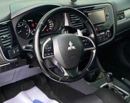 Черный Мицубиси Аутлендер, объемом двигателя 2.4 л и пробегом 212 тыс. км за 12990 $, фото 13 на Automoto.ua