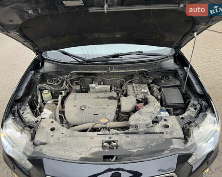 Чорний Міцубісі Аутлендер, об'ємом двигуна 2.36 л та пробігом 96 тис. км за 11700 $, фото 37 на Automoto.ua