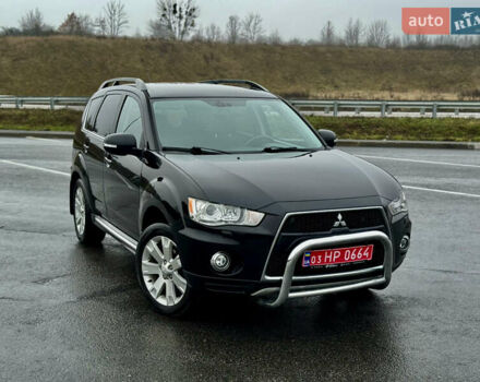 Черный Мицубиси Аутлендер, объемом двигателя 2.2 л и пробегом 215 тыс. км за 11450 $, фото 1 на Automoto.ua