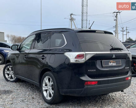 Чорний Міцубісі Аутлендер, об'ємом двигуна 2.27 л та пробігом 203 тис. км за 12600 $, фото 4 на Automoto.ua