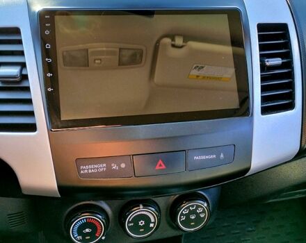 Черный Мицубиси Аутлендер, объемом двигателя 2.4 л и пробегом 140 тыс. км за 10500 $, фото 7 на Automoto.ua