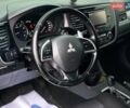 Черный Мицубиси Аутлендер, объемом двигателя 2.36 л и пробегом 212 тыс. км за 12990 $, фото 22 на Automoto.ua