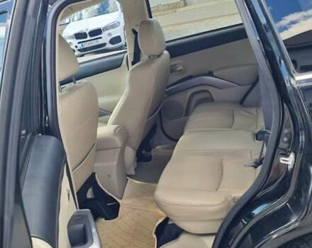 Черный Мицубиси Аутлендер, объемом двигателя 2.27 л и пробегом 195 тыс. км за 10500 $, фото 25 на Automoto.ua