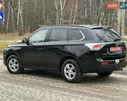 Чорний Міцубісі Аутлендер, об'ємом двигуна 2.2 л та пробігом 176 тис. км за 13500 $, фото 12 на Automoto.ua