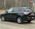 Чорний Міцубісі Аутлендер, об'ємом двигуна 2.2 л та пробігом 176 тис. км за 13500 $, фото 12 на Automoto.ua