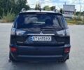 Черный Мицубиси Аутлендер, объемом двигателя 2.27 л и пробегом 195 тыс. км за 10500 $, фото 7 на Automoto.ua