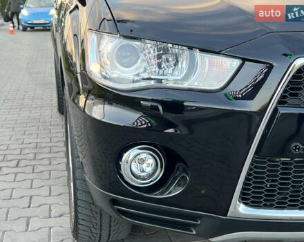 Чорний Міцубісі Аутлендер, об'ємом двигуна 2.3 л та пробігом 124 тис. км за 11999 $, фото 25 на Automoto.ua