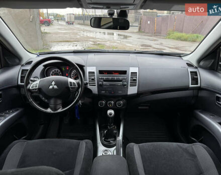 Чорний Міцубісі Аутлендер, об'ємом двигуна 2.36 л та пробігом 96 тис. км за 11700 $, фото 30 на Automoto.ua