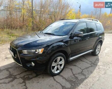 Черный Мицубиси Аутлендер, объемом двигателя 2.2 л и пробегом 218 тыс. км за 11800 $, фото 6 на Automoto.ua