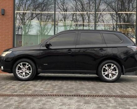 Черный Мицубиси Аутлендер, объемом двигателя 2.4 л и пробегом 212 тыс. км за 12990 $, фото 3 на Automoto.ua