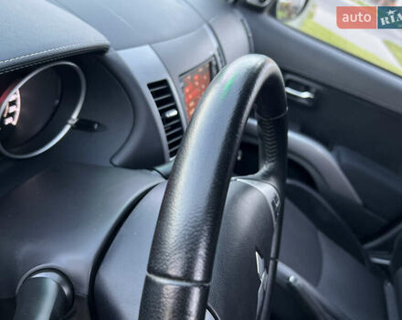 Чорний Міцубісі Аутлендер, об'ємом двигуна 2.3 л та пробігом 124 тис. км за 11999 $, фото 46 на Automoto.ua