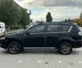 Черный Мицубиси Аутлендер, объемом двигателя 2 л и пробегом 250 тыс. км за 4850 $, фото 1 на Automoto.ua