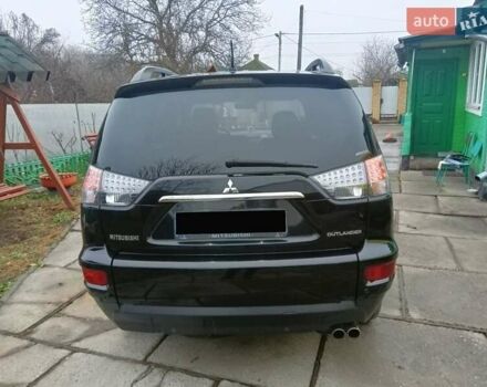 Черный Мицубиси Аутлендер, объемом двигателя 2.2 л и пробегом 218 тыс. км за 11500 $, фото 7 на Automoto.ua