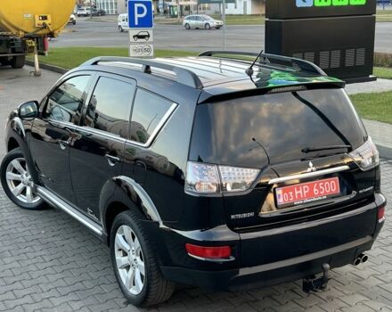 Черный Мицубиси Аутлендер, объемом двигателя 2.3 л и пробегом 124 тыс. км за 11999 $, фото 3 на Automoto.ua