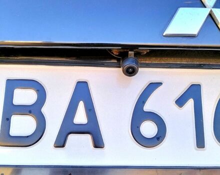 Черный Мицубиси Аутлендер, объемом двигателя 2.4 л и пробегом 140 тыс. км за 10500 $, фото 6 на Automoto.ua