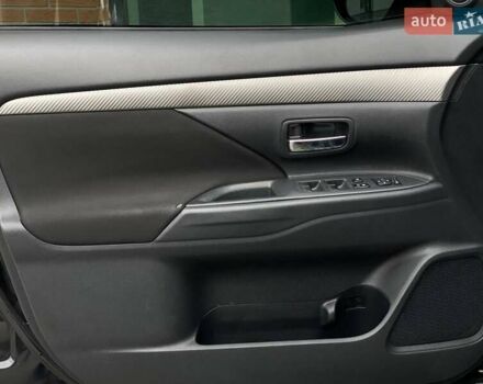 Черный Мицубиси Аутлендер, объемом двигателя 2.36 л и пробегом 212 тыс. км за 12990 $, фото 16 на Automoto.ua