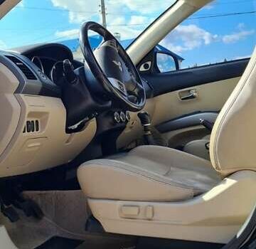 Черный Мицубиси Аутлендер, объемом двигателя 2.27 л и пробегом 195 тыс. км за 10500 $, фото 24 на Automoto.ua