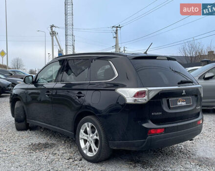 Чорний Міцубісі Аутлендер, об'ємом двигуна 2.27 л та пробігом 203 тис. км за 12600 $, фото 6 на Automoto.ua